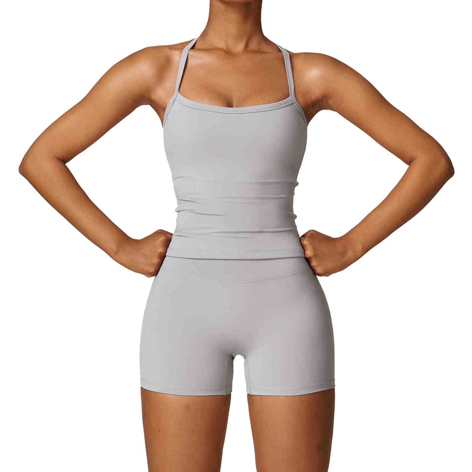 thumbnail image 1 of Conjunto de yoga de 2 piezas para mujer: camiseta sin mangas con espalda descubierta y pantalones cortos. Tejido transpirable, tirantes modernos, ideal para fitness/verano, varias tallas., 1 of 7